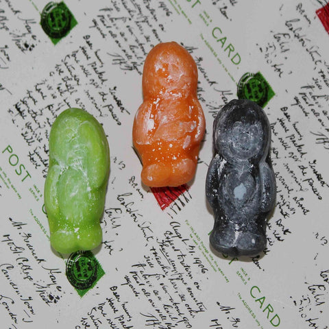 green, orange and black handmade jelly baby brooches